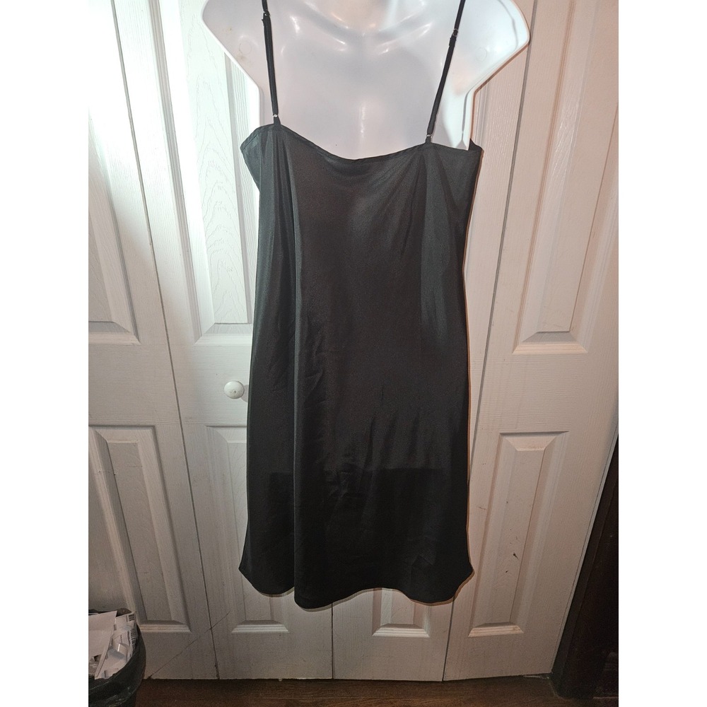 BLACK full slip w/ no brand name or sizes, no lace, just a plain polyester